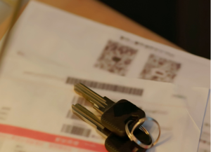 Car keys over bills
